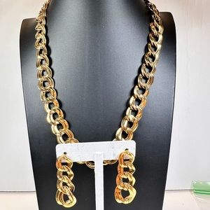Monet gold tone double link necklace with matching pierced earring